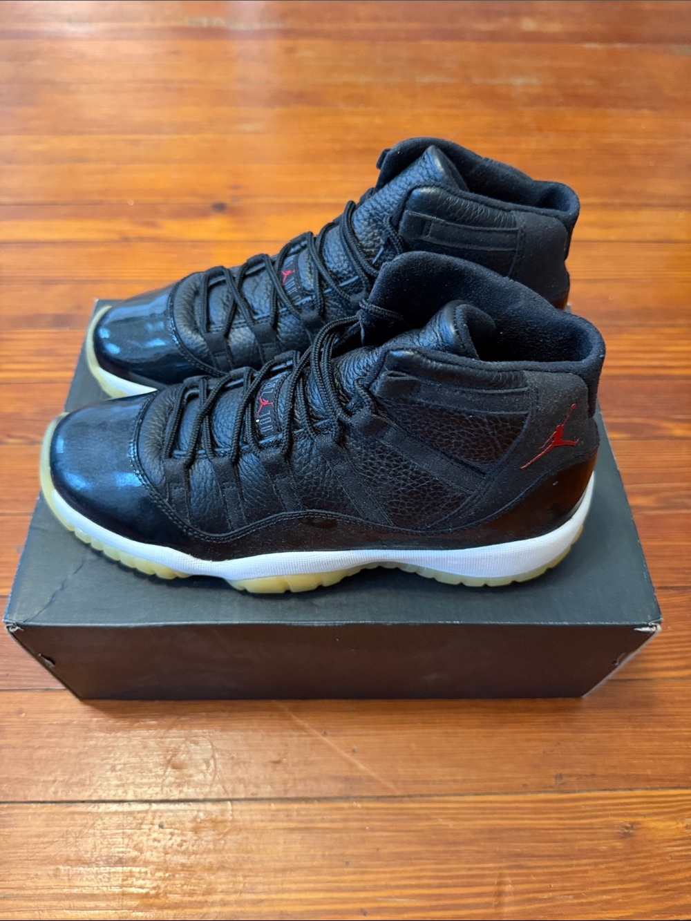 New in box Jordan 11 Black High-Top Sneakers with Red Accent Size 7Y